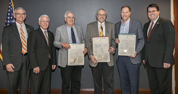 From left to right, University of Tennessee Interim Provost and Senior Vice Chancellor, Dr. John Zomchick and Interim Chancellor Dr. Wayne Davis, second from left, joined TN. state Rep. Eddie Smith, far right, in honoring three UT professors with a resolution stating they are among the top cited researchers in the world. The three professors in the center, holding copies of the resolution are, from left to right, Dr. David Simberloff, Gore Hunger Professor of Environmental Science; Dr. Louis Gross, Director of The Institute for Environmental Modeling and 2018 SEC Faculty Achievement Award winner; and Dr. David Mandrus, Jerry and Kay Henry Endowed Professor in Materials Science and Engineering. Photographed on Friday, May 18, 2018 at the University of Tennessee campus in Knoxville. ..Photo by Erik Campos